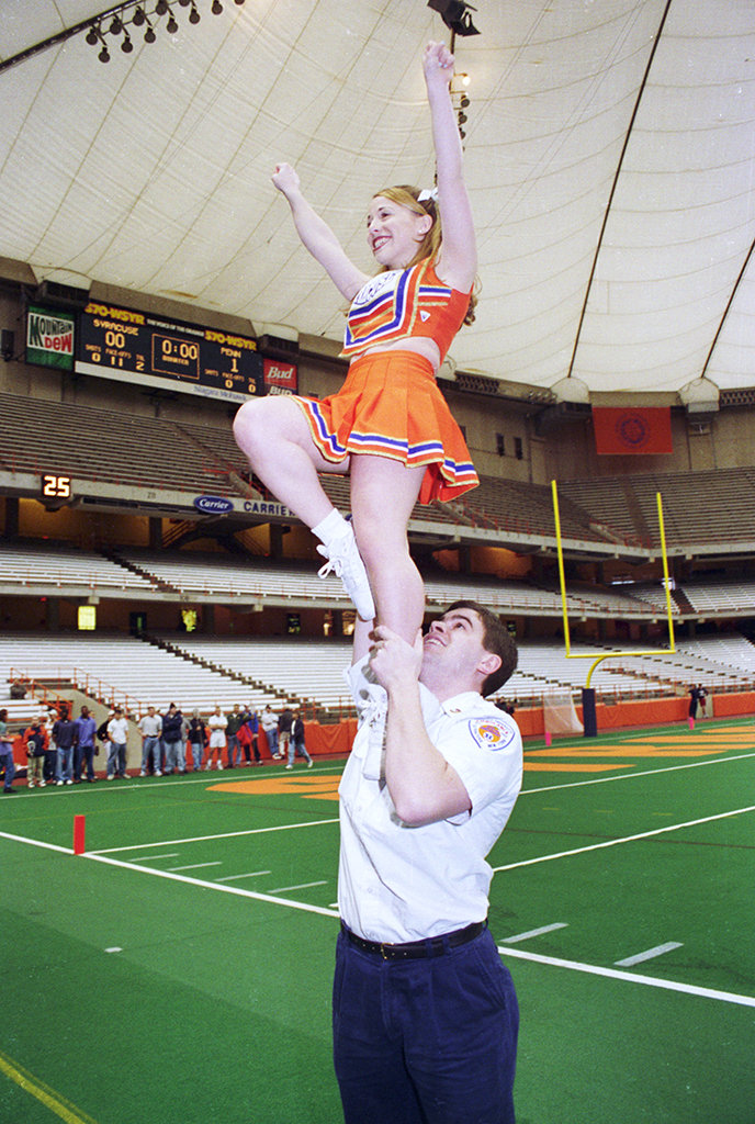 As an undergraduate student, Josh Tournas worked for Syracuse University Ambulance but he was also a cheerleader. Photo © by Bradley Wilson. 720C18