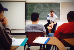 Steve Curry teaches CPR to a group at Harpur's Ferry Student Volunteer Ambulance in Binghamton, N.Y. in 1996. Photo by Bradley Wilson 706C18